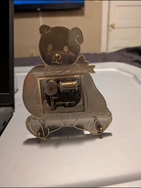 vintage Sankyo music box teddy bear design with a see-through plastic Movement
